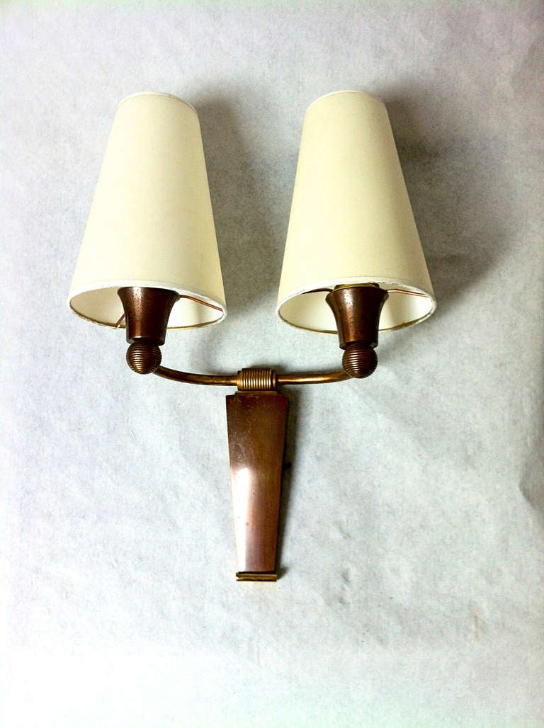 Jean Pascaud small charming refined pair of sconces in gold oxidized bronze.