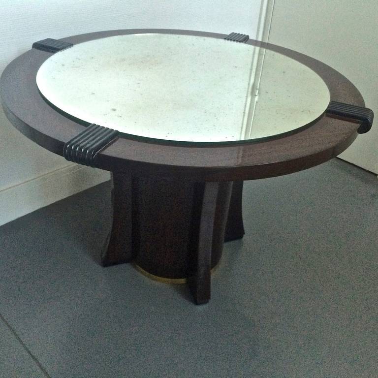 Maurice Jallot coffee table with mirror top and brass circled base.