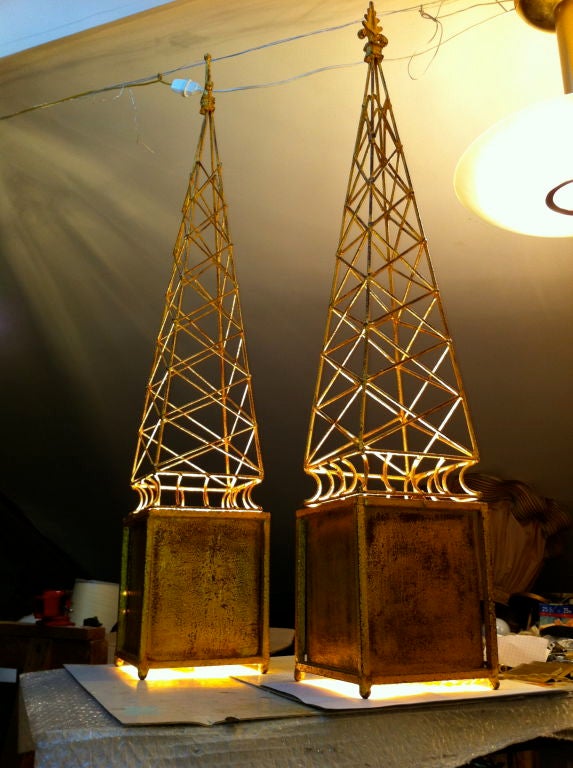 Spectacular and unusual tall gold leaf wrought iron obelisk pair of table lamps