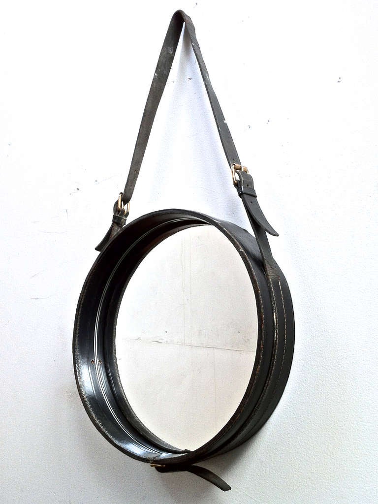Jacques Adnet pair of small charming black leather hand stitched mirror.