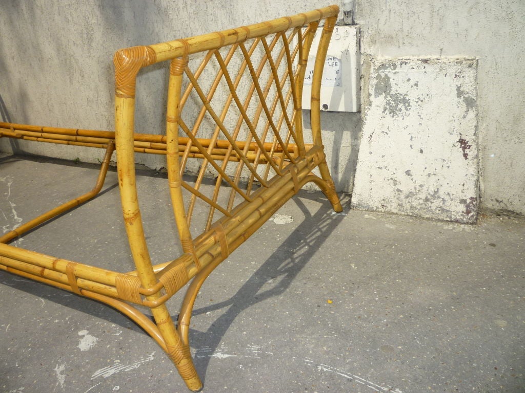 Louis Sognot rattan daybed from the 1950s in the Riviera style.