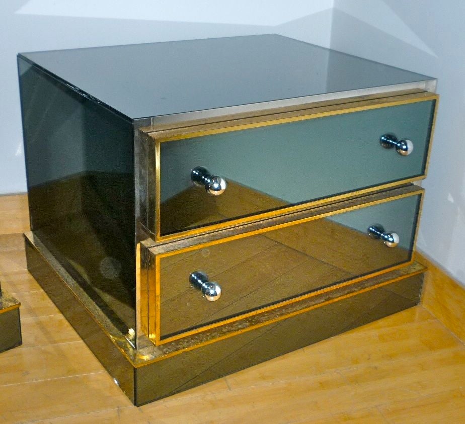 Maison Jansen pair of mirrored two-drawer bedsides with a powerful design and gold bronze frames and nickel knobs.