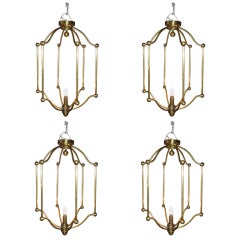 Exceptional Set of Four Long 1940s Gold Bronze Cage French Chandeliers
