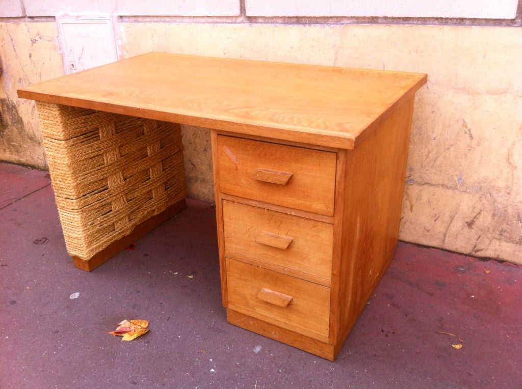 Audoux-Minet oak and woven hay rope 1950s three drawers desk.