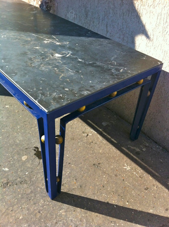 Jean Royere extremely rare long blue cobalt metal painted coffee table with a black marble and gold balls.