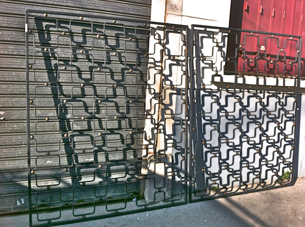 Jean Royere rare pair of indoor black and good painted metal gate.