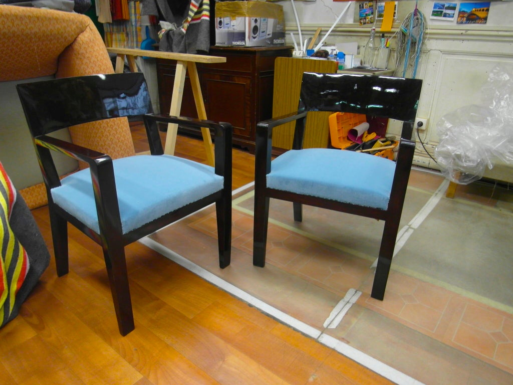 Jean Royère chic pair of armchair recovered in blue velvet.