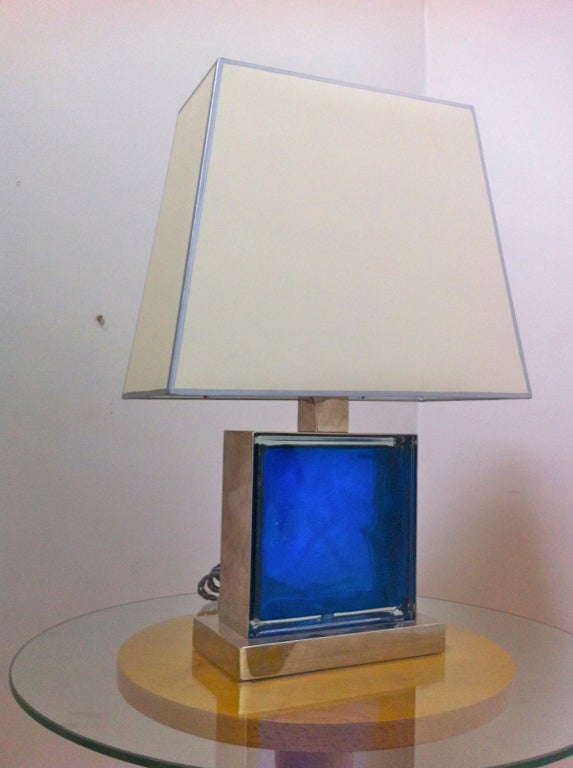 1990s pair of modernist nickled meat and blue glass lamps.