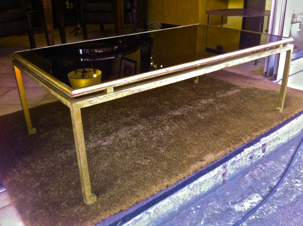 Maison Ramsay large coffee table in gold leaf wrought iron.