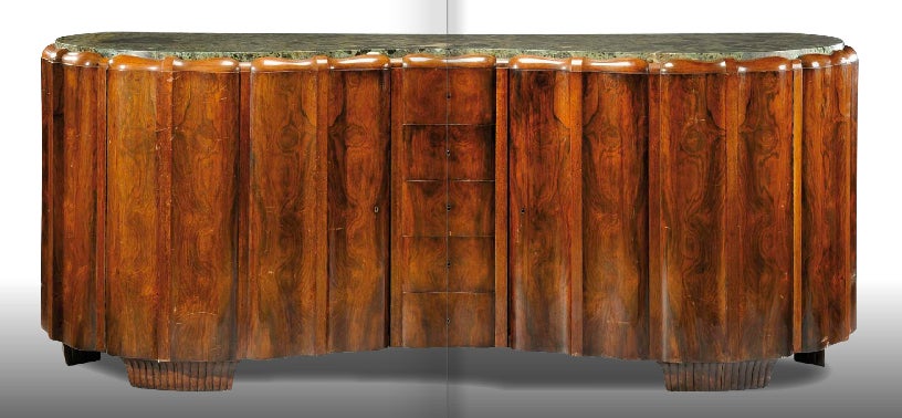 Maurice Dufrene documented exceptional buffet in carved mahogany with a marble top.