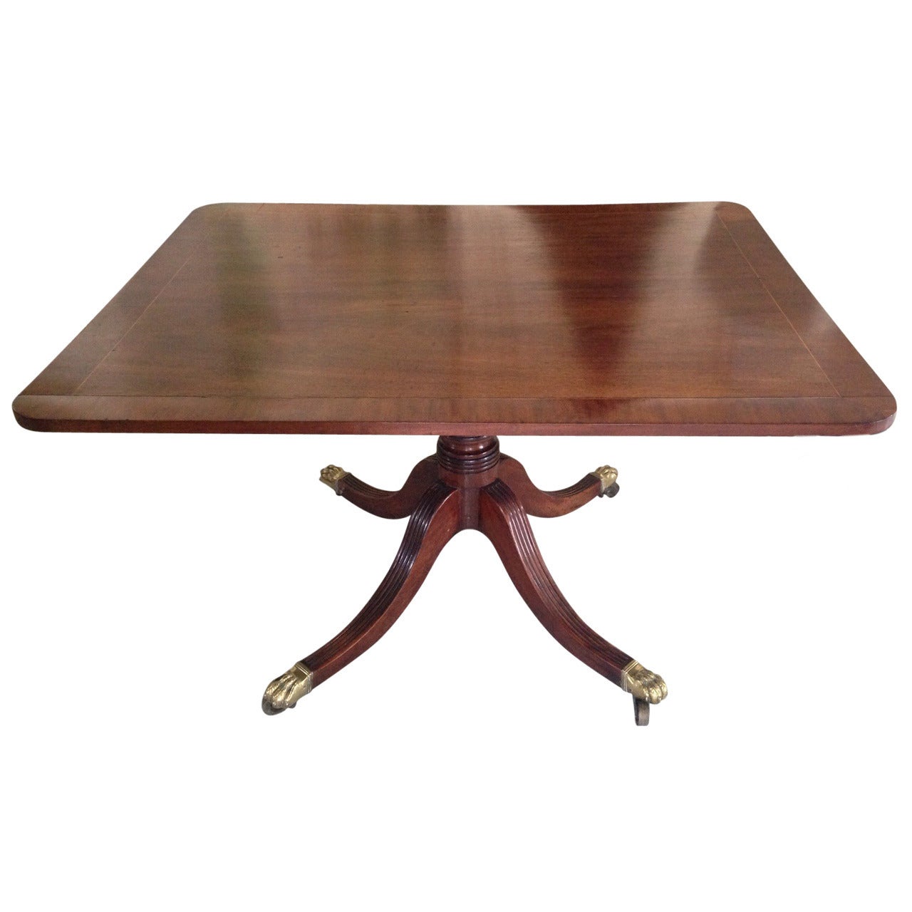 English Georgian Tilt-Top Mahogany Supper Table, Brass Lion's Paw Feet For Sale