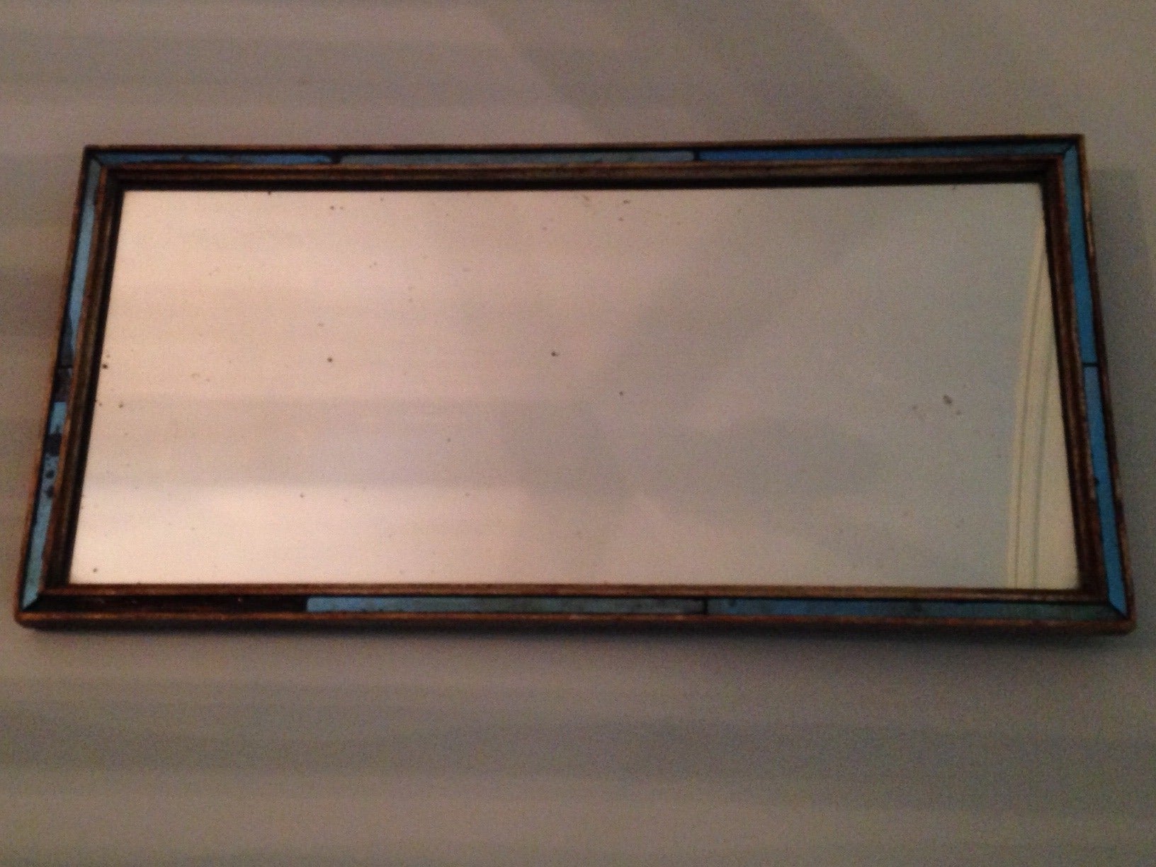 Pair of simple and elegant English Regency-period mirrors with gesso frames, cobalt glass filet.