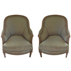 Pair 19th C. French Bergeres upholstered in blue/grey satin, citron satin backs