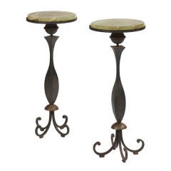 Pair of pedestal tables by Gilbert Poillerat