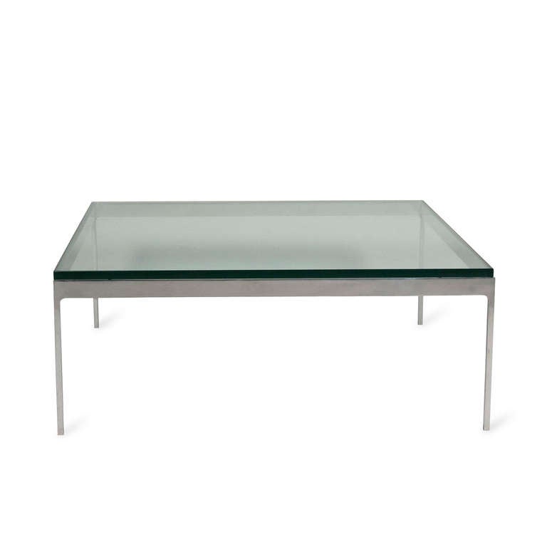 Polished steel frame, square coffee table, with thick glass top, by Nico Zographos, American circa 1980. Model number TA35. 36 inches square, height 14 in. (Item #2018)