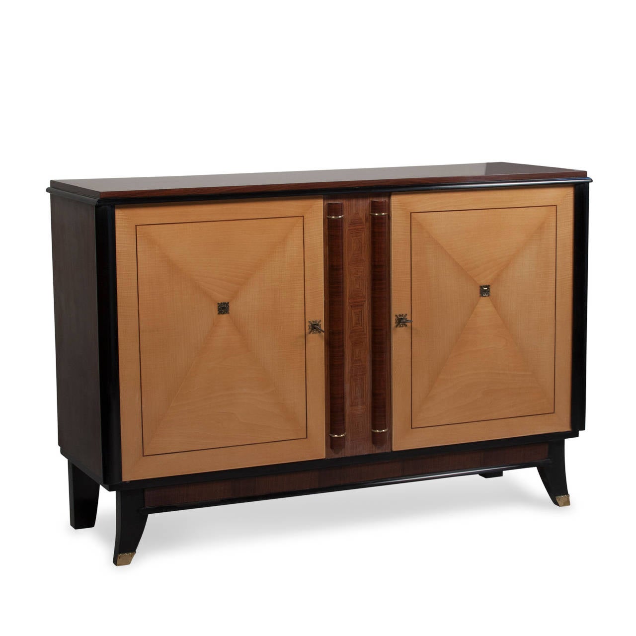 Rosewood, walnut and sycamore two door cabinet, the sycamore door faces having matched veneer star pattern centered on brass emblem. With ebonized accents and brass keyholes, the top surface and sides beautifully grained rosewood and walnut, the