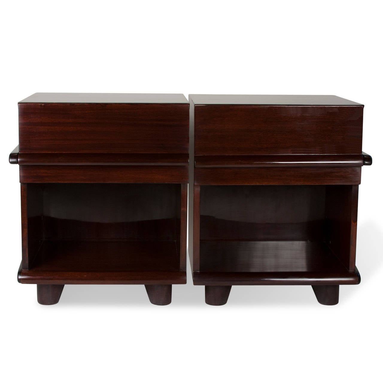 Pair of walnut end tables, upper drawer and open lower storage compartment, having molded element that crosses the front of drawer and wraps around to the side. Short wide circular legs. An opposing pair, American, 1970s. Width 20 in, depth 18 in,