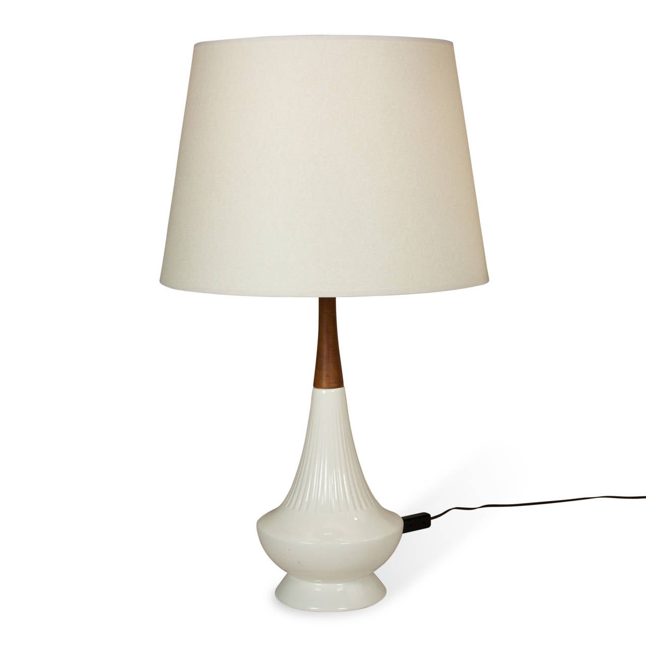 White ceramic table lamps, tapered form with walnut necks, Danish 1950s. Overall height 30 in. Height to top of wood 20 in. Largest diameter of base 8 in. Custom silk shades measure top diameter 14 in, bottom diameter 18 in, height 12 in. (Item