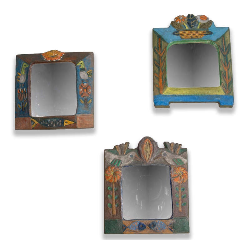 Set of three hand carved and hand painted wood frame mirrors. By Les Argonautes, Vallauris, France, circa 1970. Hand signed to backside. Each measures approximately 6 1/2 in x 6 in.
Price for set of three.