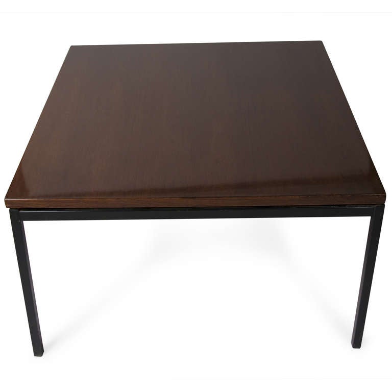 Dark palissandre surface coffee table, of square shape, the surface resting on four black lacquered steel legs, by Alain Richard, French late 1950s. 30 inch square, height 18 in. (Item #1628)