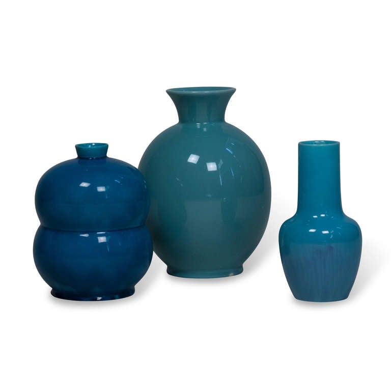Three vases, sold as a group or separately. From left to right in main photo:
1) Turquoise blue double lobe ceramic vase, by Primavera, French 1930s. Signed to underside Primavera, VF. Height 8 in, largest diameter 6 in. (Item #2024) Condition