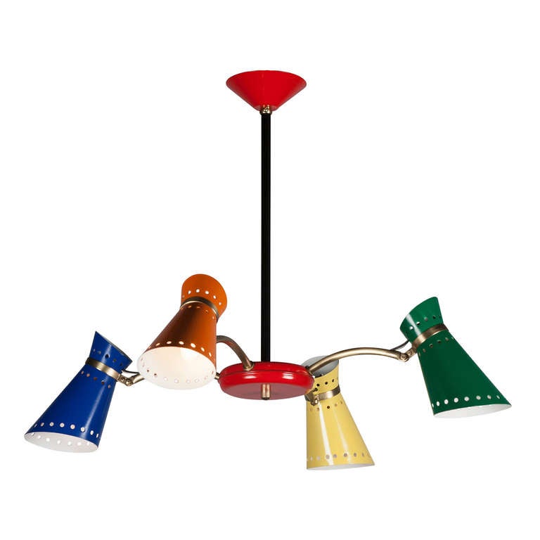 Lacquered metal and brass four light chandelier, the shades in bright orange, blue, yellow and green, and ceiling canopy and central disc in bright red, each shade with three bands of perforations, and each shade adjustable with a hinge joint.
