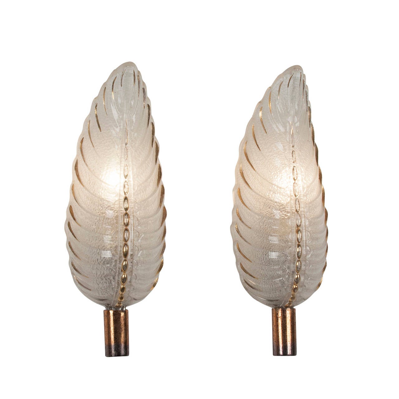 Pair of frosted leaf form glass sconces, the glass having gold accents, on bronze mounts by Ezan, French 1940s. Signed. Height 11 1/2 in, width 3 in. (Item #2092)
Price for pair.