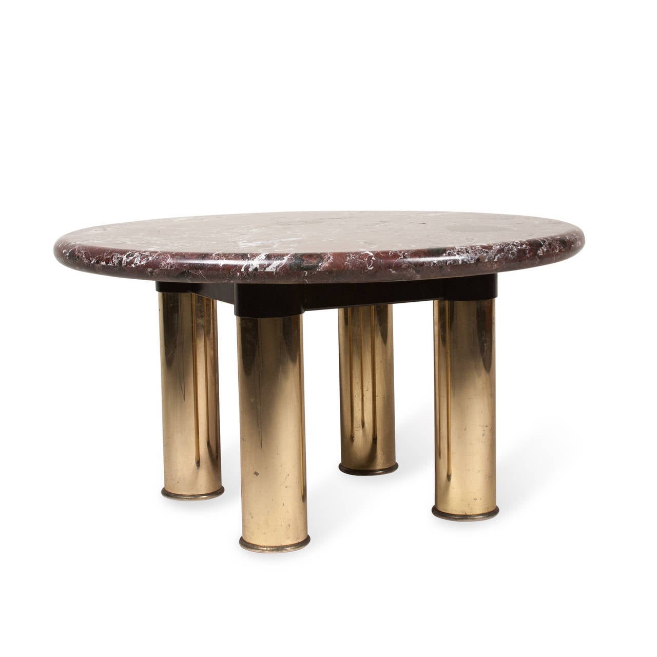 Marble circular end or side table, rounded edge, the marble mounted on four cylindrical lacquered brass legs, American, 1980s. Diameter 30 in, height 16 1/2 in. (Item #2262)
