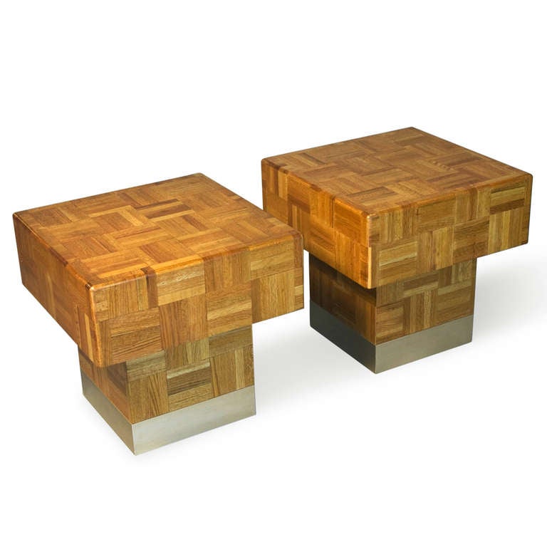 Pair of square patchwork elm end tables, the square block surface supported by a smaller block form having and brass floor band, American 1970s. 21 3/4 in square, height 21 1/4 in. (Item #1617)