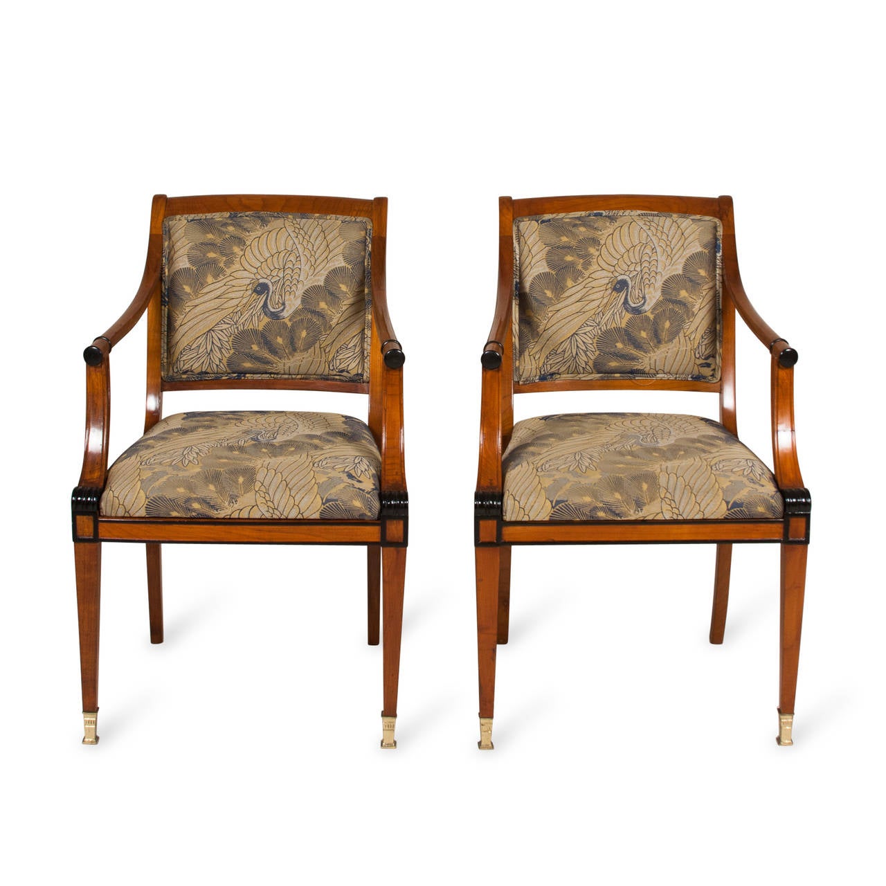 Pair of fruitwood Empire style open armchairs, gracefully arced turned arms ending in ebonized accent, the ebonized accent repeated on the front seat corner, tapered legs, bronze sabots, original silk upholstery, American 1990s. Back height 33 in,