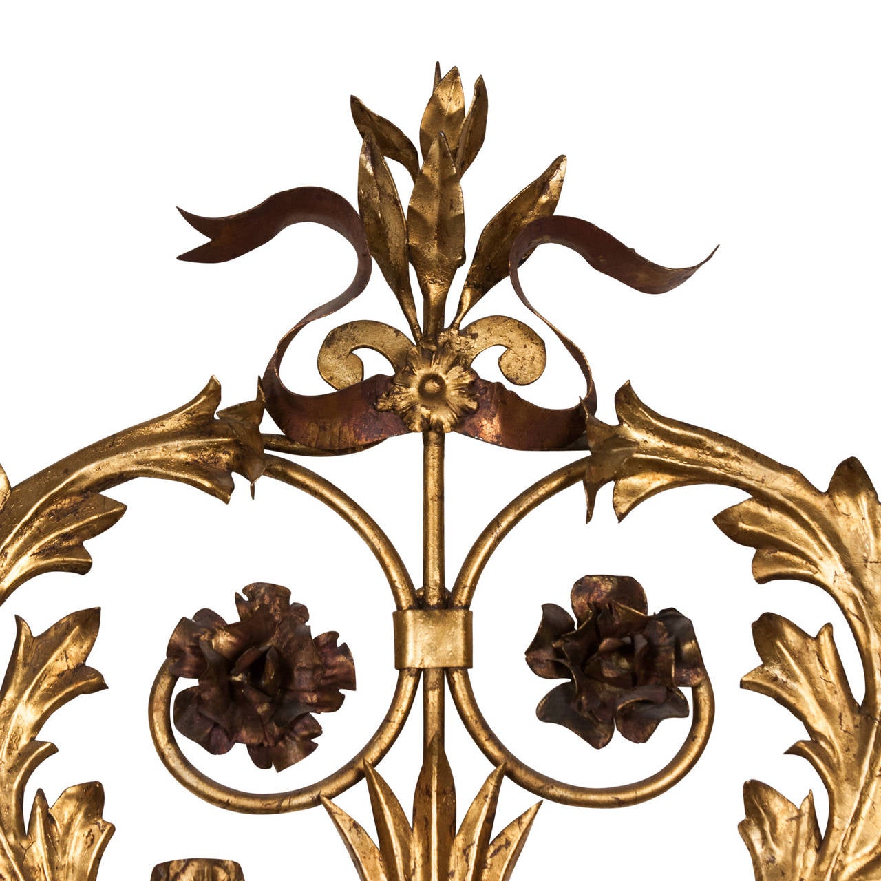 Elaborate floral and leaf form gilt iron candle sconce, takes four candles, Italian 1960s. Width 23 in, height 25 in, depth 2 in. (Item #2316)