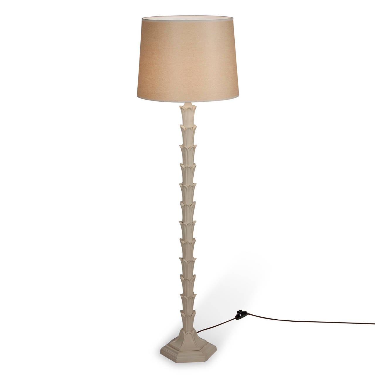 Antique white lacquered metal floor lamp, with acanthus leaf decoration going up the column, and on a hexagonal base, American, early 1960s. In custom paper shade. Height to top of shade 56 in, diameter of base 8 1/2 in. Shade measures top dia 12