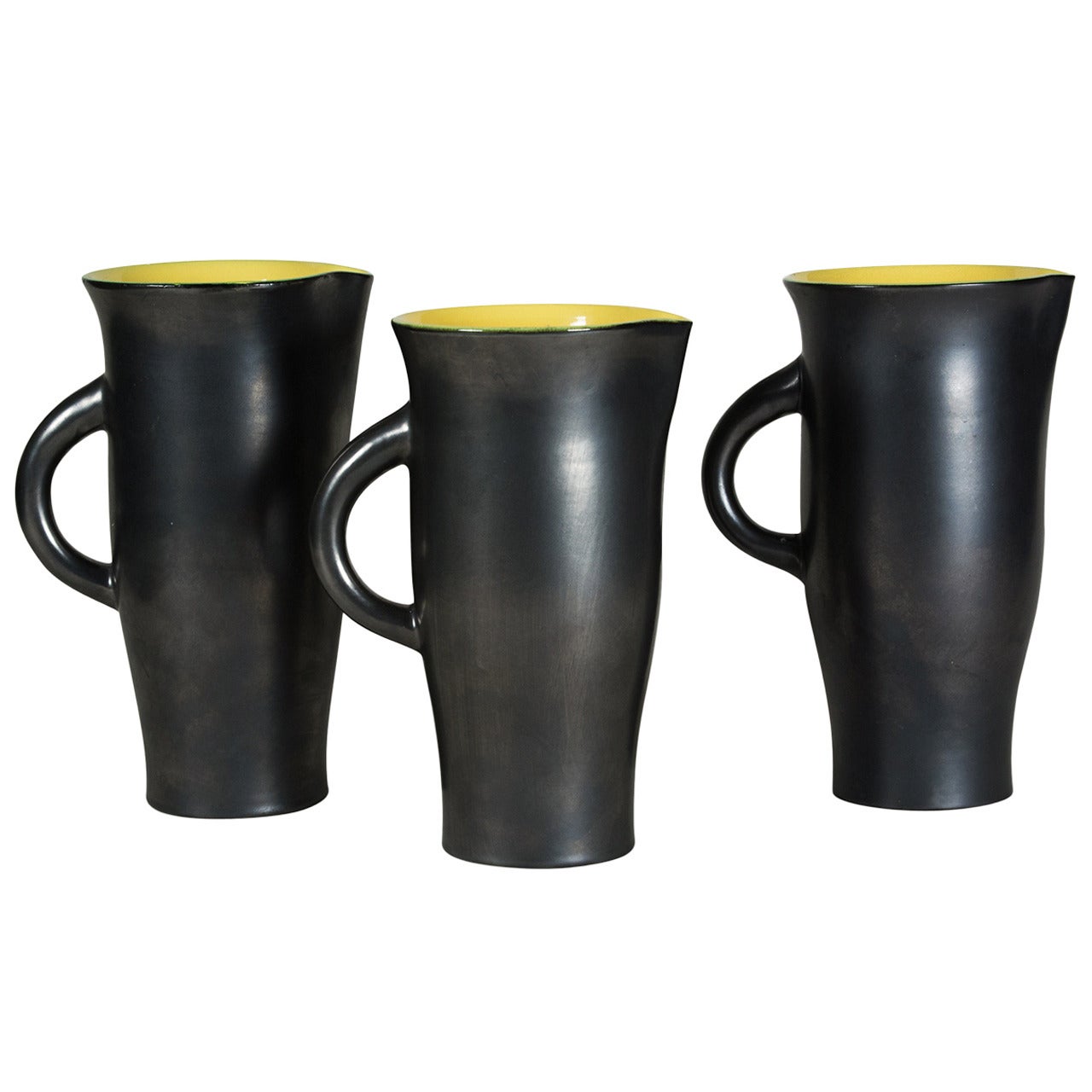 Three Lustre Glaze Ceramic Pitchers by Elchinger