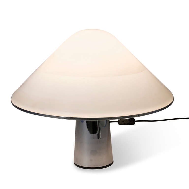 Frosted and textured plexi cone shaped lamp, on slightly tapered chromium column base. By Guzzini, italian, 1970s. Overall height 16 1/2 in, largest diameter of shade 17 1/2 in, height of shade 9 in, diameter of base at bottom 5 in. (Item #1517)