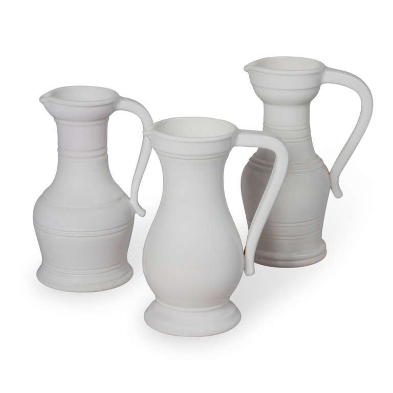 Set of three white ceramic 