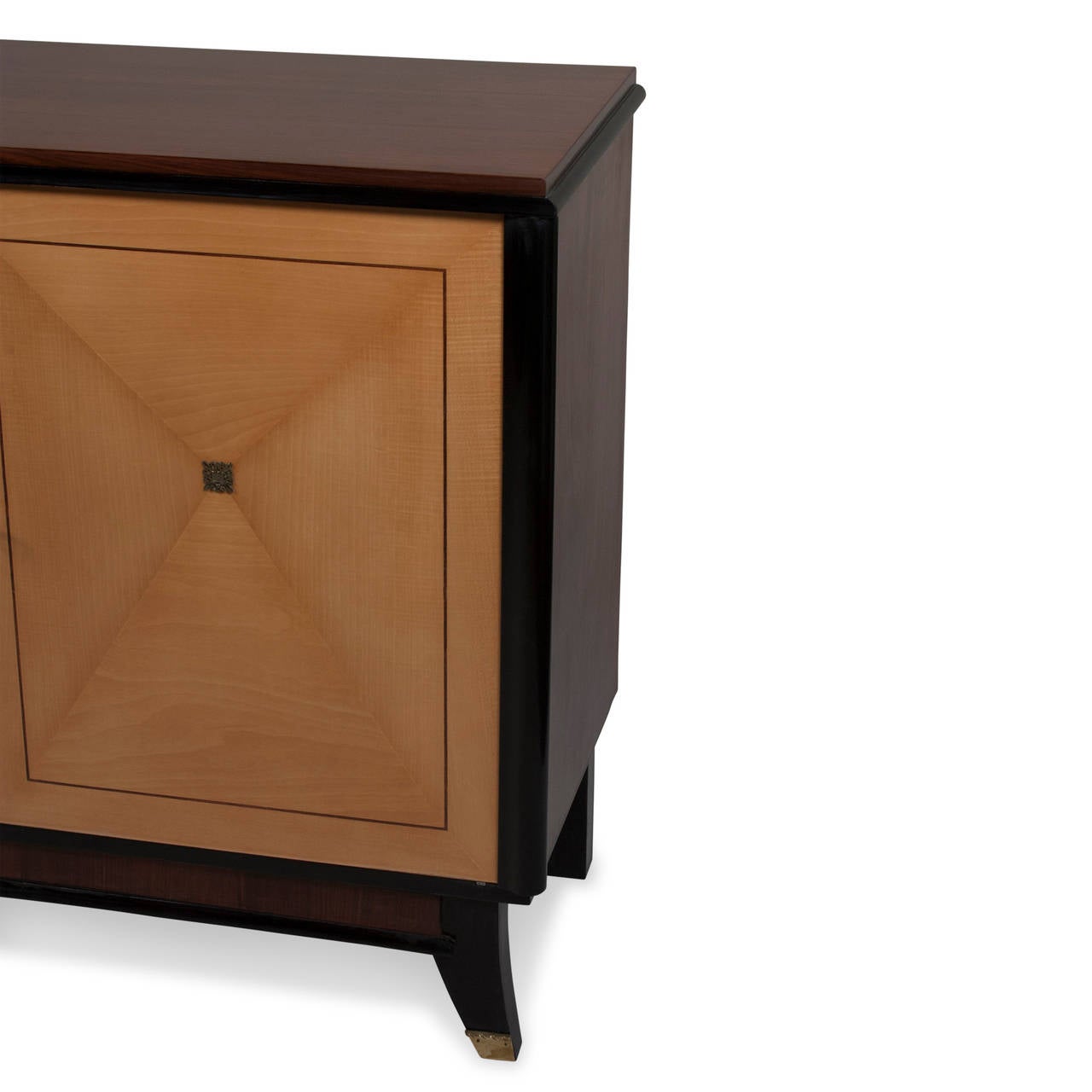 Rosewood, walnut and sycamore two door cabinet, the sycamore door faces having matched veneer star pattern centered on brass emblem. With ebonized accents and brass keyholes, the top surface and sides beautifully grained rosewood and walnut, the