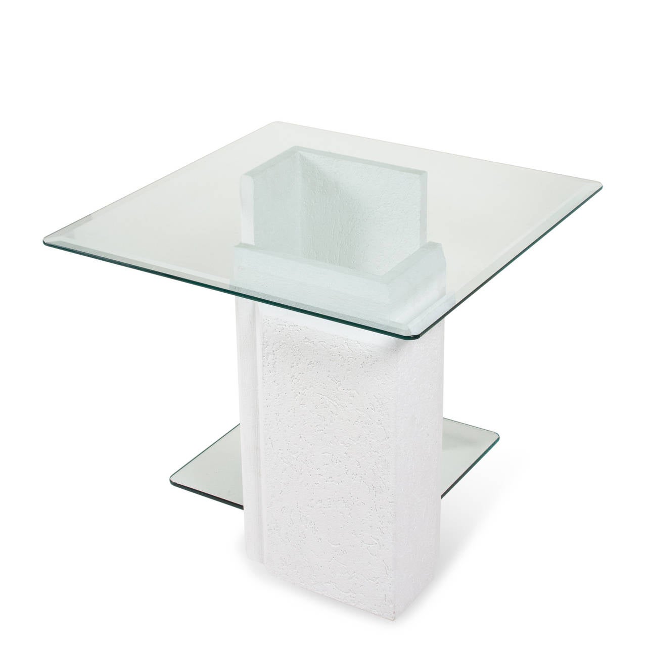 Pair of square textured white painted stone table bases, glass top with lower glass shelf. The stone elements in L-shape. American 1980s. 26 in square, height 21 3/4 in. Lower glass piece is 16 3/4 in square. (Item #2339 sats)
