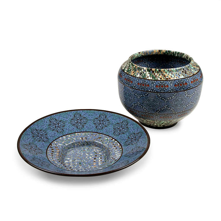 : Two ceramic pieces - priced for the set of two. Also sold separately, please inquire. 

Large circular ceramic charger, the form built by ceramic mosaic elements in colors of blue, grey, black, and white, a central blue band over a speckled