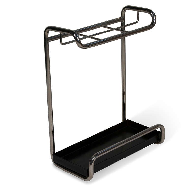 Tubular chrome steel frame umbrella stand, with black metal catch basin, grid top, German 1930s. Height 24 1/2 in, 17 3/4  in x 7 3/4 in. (Item #2032)