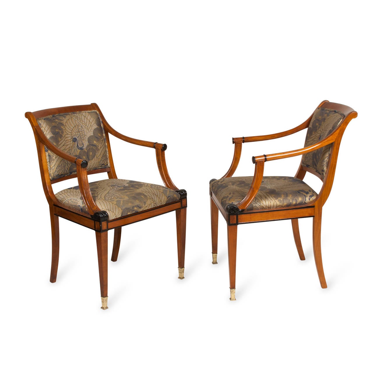 Pair of fruitwood Empire style open armchairs, gracefully arced turned arms ending in ebonized accent, the ebonized accent repeated on the front seat corner, tapered legs, bronze sabots, original silk upholstery, American 1990s. Back height 33 in,