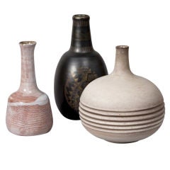 A Striking Group of Three Important Ceramic Vases