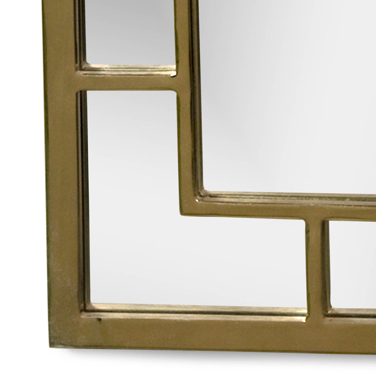 Double border brass frame mirror, with rectangular mirror panels on outer edge framing the center mirror, all with brass borders, American 1970s. 41 in x 25 in. (Item #1676)