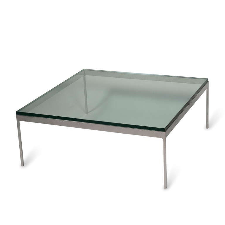 Polished steel frame, square coffee table, with thick glass top, by Nico Zographos, American circa 1980. Model number TA35. 36 inches square, height 14 in. (Item #2018)