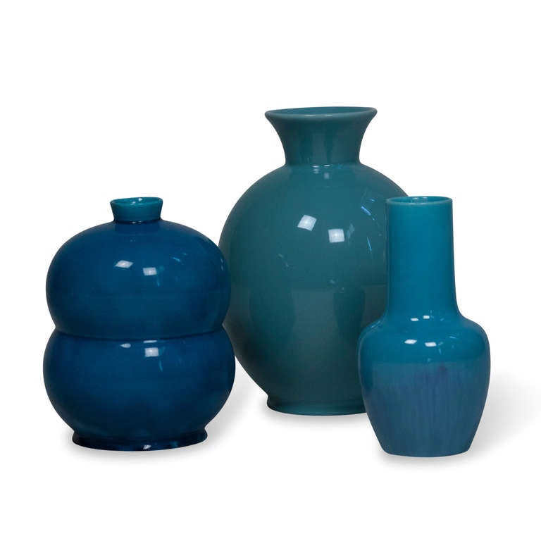 Three vases, sold as a group or separately. From left to right in main photo:
1) Turquoise blue double lobe ceramic vase, by Primavera, French 1930s. Signed to underside Primavera, VF. Height 8 in, largest diameter 6 in. (Item #2024) Condition