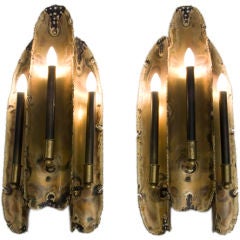 Pair of Patinated Metal Flame Sconces by Tom Greene
