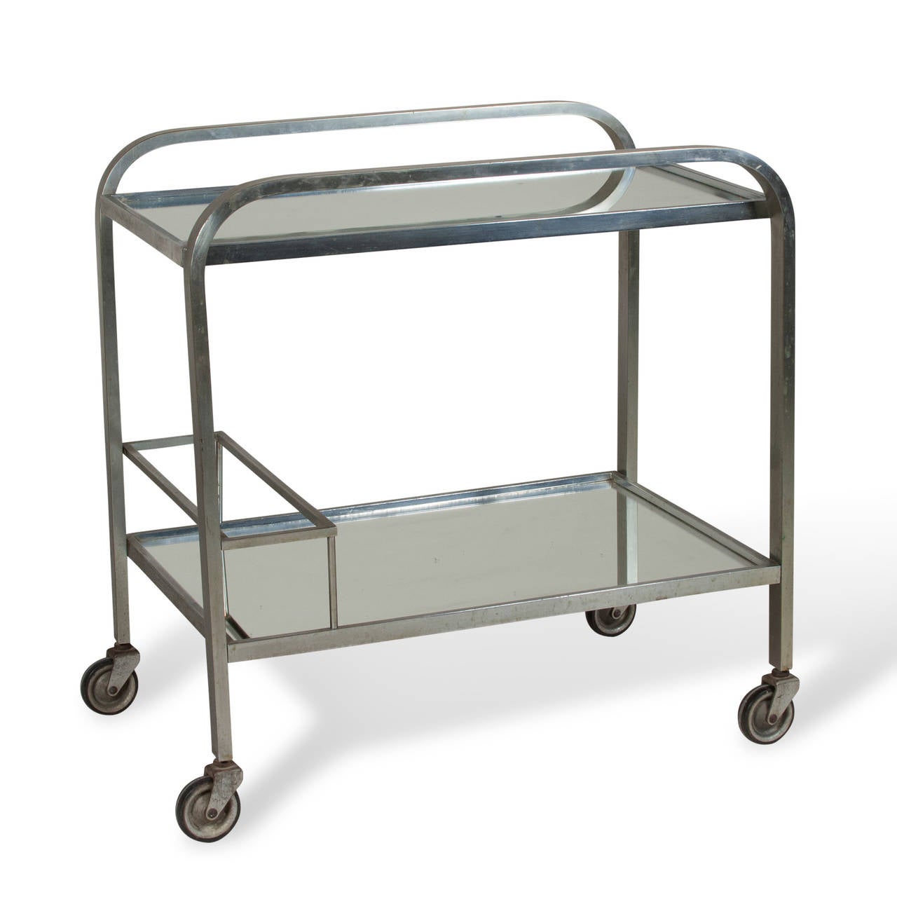 Mirrored two tier serving cart, chrome frame, raised rail handles and lower bottle storage area, on casters. French 1930s. W 16 in x L 25.6 in, H 26 in. (Item #2120)