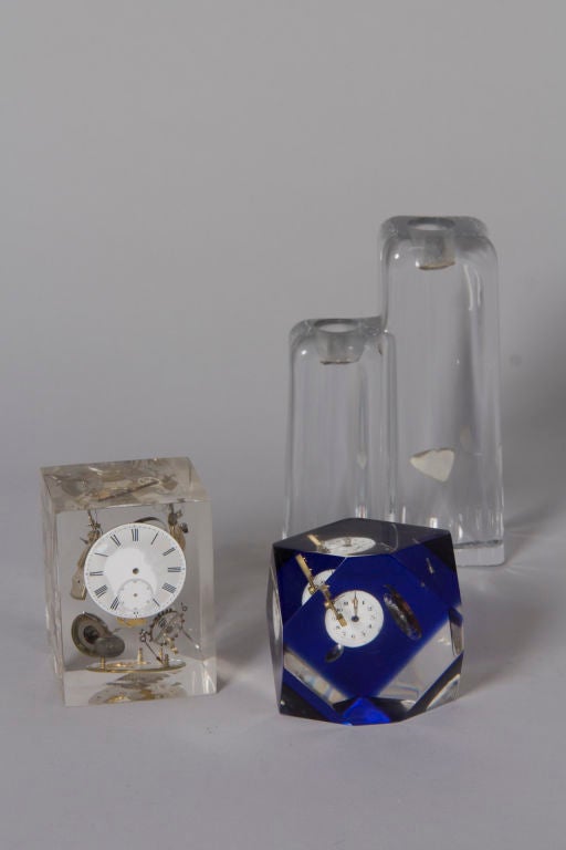 Exploding Clock Inclusions and Daum Candleholder