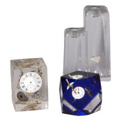 Exploding Clock Inclusions and Daum Candleholder