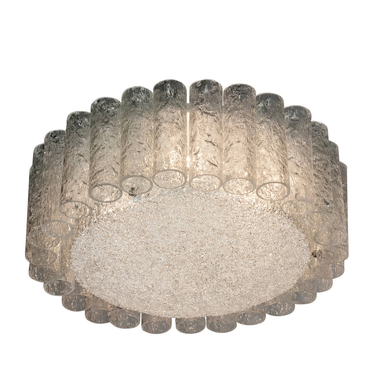 Flush moiunt textured glass chandelier, of overall circular form, a ring of glass cylinders around a central textured glass disc, by Doria, German, 1960s. Diameter 16 in, height 6 3/4 in.