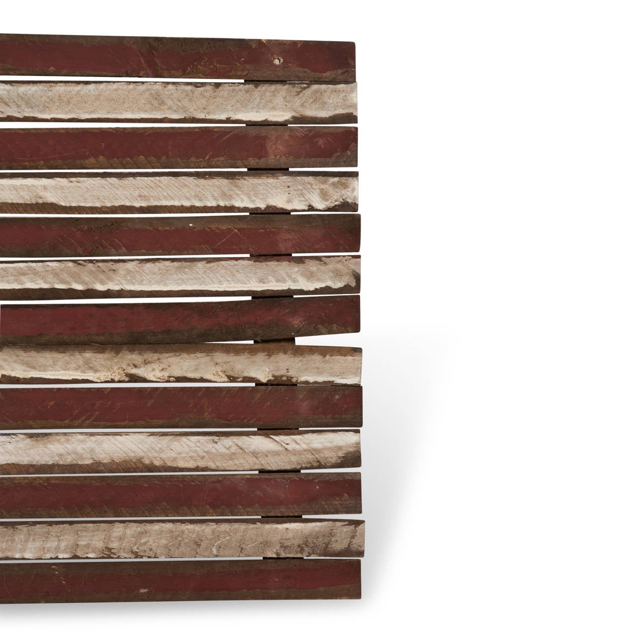 Painted folk art scrap wood American flag, with applied cut wood stars in a ring around a larger center star, American late 20th century, 32 x 19 in, depth 2 in. (Item #2309)